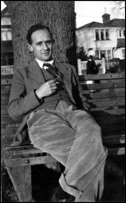 Picture of Arthur Prior sitting on a bench